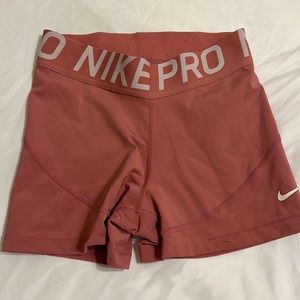 Pink Nike pros
